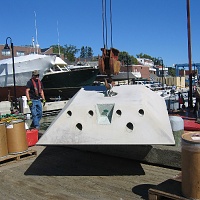 HMS 8000 Low Profile mooring is hoisted onto barge at Maine Maritime Academy.