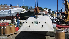 HMS 8000 Low Profile mooring is hoisted onto barge at Maine Maritime Academy.